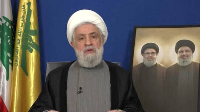 6W5IE2UII5PBLOCUED7MLSZMIQ Lebanon's Hezbollah leader Sheikh Naim Qassem delivers a speech from an unknown location, November 20, 2024 in this still image from video. REUTERS TV/Al Manar TV via REUTERS/File Photo