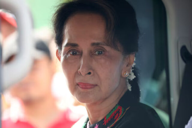 W4KZ5NAYUNI5FFIBRAFV5SSGGI Aung San Suu Kyi arrives at a school in Kawhmu, Yangon, Myanmar, July 18, 2019. REUTERS/Ann Wang/File Photo