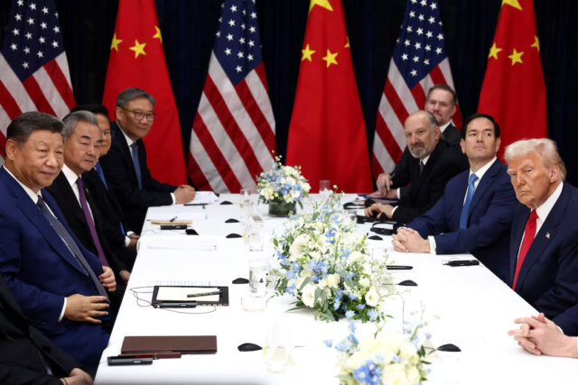 QDAYXK3EGNJVFI2VRZ2L4ZN3WQ U.S. President Donald Trump, accompanied by U.S. Secretary of State Marco Rubio and U.S. Secretary of Commerce Howard Lutnick, attends a bilateral meeting with Chinese President Xi Jinping, accompanied by Chinese Foreign Minister Wang Yi, at Gimhae International Airport, on the sidelines of the Asia-Pacific Economic Cooperation (APEC) summit, in Busan, South Korea, October 30, 2025. REUTERS/Evelyn Hockstein