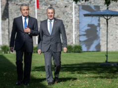 China Seeks Greater Swiss Investment As Deal Talks Gain Pace China's Foreign Minister Wang Yi and Swiss Foreign Minister Ignazio Cassis walk during an official visit at Castelgrande in Bellinzona, Switzerland, October 10, 2025. ELIA BIANCHI/Pool via REUTERS
