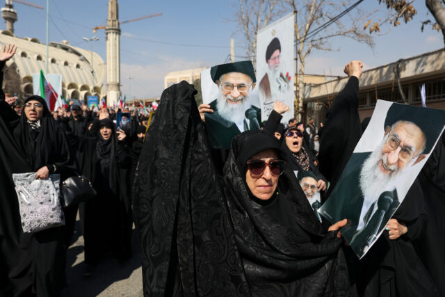 People attend an anti-Israeli and U.S rally in Tehran