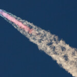 SpaceX's Starship flies during its fifth flight test, in Boca Chica, Texas, U.S., October 13, 2024. REUTERS/Kaylee Greenlee Beal