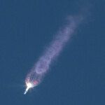 SpaceX's Starship flies during its fifth flight test, in Boca Chica, Texas, U.S., October 13, 2024. REUTERS/Kaylee Greenlee Beal