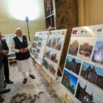 PM Narendra Modi witnessed the exhibition on restoration and conservation of Vat Phou temple complex done by the Archaeological Survey of India in Laos. (Courtesy: @MEAIndia via X)