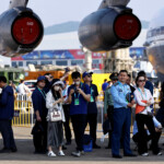 People visit the China International Aviation and Aerospace Exhibition, or Airshow China, in Zhuhai, Guangdong province, China November 12, 2024. REUTERS/Tingshu Wang