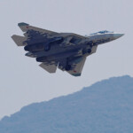 A Russian SU-57 stealth fighter jet flies in the sky at the China International Aviation and Aerospace Exhibition, or Airshow China, in Zhuhai, Guangdong province, China November 12, 2024. REUTERS/Tingshu Wang