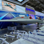 A model of CH-7 stealthy unmanned aircraft is displayed alongside mockups of air-to-ground missiles at the China International Aviation and Aerospace Exhibition, or Airshow China, in Zhuhai, Guangdong province, China November 13, 2024. REUTERS/Sophie Yu