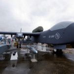 A Jetank (SS-UAV) drone is displayed alongside munitions at the China International Aviation and Aerospace Exhibition, or Airshow China, in Zhuhai, Guangdong province, China November 14, 2024. REUTERS/Tingshu Wang