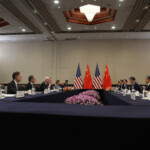 U.S. President Joe Biden, U.S. Secretary of State Antony Blinken, U.S. National Security Adviser Jake Sullivan, Chinese Foreign Minister Wang Yi, Chinese Commerce Minister Wang Wentao and China's President Xi Jinping attend a bilateral meeting on the sidelines of the APEC Summit in Lima, Peru, November 16, 2024. REUTERS/Leah Millis