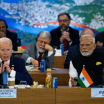 US President Joe Biden delivers remarks as PM Narendra Modi listens during the G20 Summit in Rio. Eric Lee/Pool via REUTERS