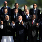 Turkish President Tayyip Erdogan, Indian Prime Minister Narendra Modi, Brazil's President Luiz Inacio Lula da Silva, South Africa's President Cyril Ramaphosa and China's President Xi Jinping pose for a group photo accompanied by other leaders during the G20 summit in Rio de Janeiro, Brazil, November 18, 2024. REUTERS/Pilar Olivares