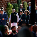 Members of leader countries including India's Prime Minister Narendra Modi, Spain's Prime Minister Pedro Sanchez and European Commission President Ursula von der Leyen walk down a ramp towards the family photo during the G20 summit at the Museum of Modern Art in Rio de Janeiro, Brazil, November 18, 2024. REUTERS/Leah Millis