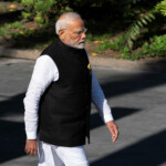 Prime Minister Narendra Modi walks to join world leaders for a group photo, during the G20 Summit, in Rio de Janeiro, Brazil, November 18, 2024. Manuel Balce Ceneta/Pool via REUTERS