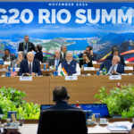 U.S. President Joe Biden, alongside Indian Prime Minister Narendra Modi and Brazilian President Luiz Inacio Lula da Silva speaks on the second day of the G20 Summit at the Museum of Modern Art in Rio De Janeiro, Brazil, November 19, 2024. Saul Loeb/Pool via REUTERS
