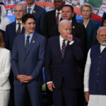 Italy's Prime Minister Giorgia Meloni, Canada's Prime Minister Justin Trudeau, U.S. President Joe Biden, Prime Minister Narendra Modi, European Commission President Ursula von der Leyen, Portugal's Prime Minister Luis Montenegro, prepare for a group picture at the G20 summit in Rio de Janeiro, Brazil, November 19, 2024. REUTERS/Pilar Olivares
