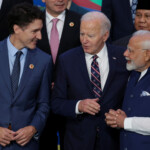 Canada's Prime Minister Justin Trudeau, U.S. President Joe Biden and Prime Minister Narendra Modi talk while standing for a group photo with other leaders during the G20 summit at the Museum of Modern Art in Rio de Janeiro, Brazil, November 19, 2024. REUTERS/Ricardo Moraes
