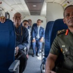Indian envoy to Guyana Amit Telang along with other officials inside the HAL-228 aircraft (Courtesy: PM Brigadier Mark Phillips via Facebook)