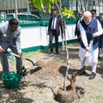 Taking the global campaign #EkPedMaaKeNaam forward, PM Narendra Modi and Guyana President Mohamed Irfaan Ali planted a sapling in honour of the mother of President Ali at the State House. (Courtesy: @MEAIndia via X)