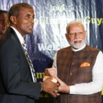 Mayor of Georgetown hands over the ‘Key to the City of Georgetown’ to PM Modi. (Courtesy: @MEAIndia via X)