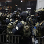 Soldiers prepare to advance to the main building of the National Assembly after South Korean President Yoon Suk Yeol declared martial law in Seoul, South Korea, December 3, 2024. Yonhap via REUTERS