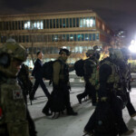Military forces walk outside the National Assembly, after South Korean President Yoon Suk Yeol declared martial law, in Seoul, South Korea, December 4, 2024. REUTERS/Kim Hong-Ji
