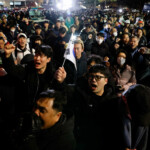 People gesture outside the National Assembly, after South Korean President Yoon Suk Yeol declared martial law, in Seoul, South Korea, December 4, 2024. REUTERS/Kim Soo-hyeon