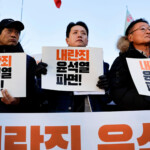 People take part in a rally to demand South Korean President Yoon Suk Yeol's removal from power, in Seoul, South Korea, December 4, 2024. REUTERS/Kim Soo-hyeon