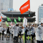 People protest at a rally to condemn South Korean President Yoon Suk Yeol's surprise declarations of the failed martial law and to call for his resignation in Seoul, South Korea, December 5, 2024. REUTERS/Kim Kyung-Hoon