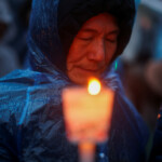 A person takes part in a candlelight vigil to demand the resignation of South Korean President Yoon Suk Yeol, who declared martial law which was reversed hours later, at the National Assembly in Seoul, South Korea, December 5, 2024. REUTERS/Kim Hong-ji
