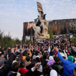 People gather at Saadallah al-Jabiri Square as they celebrate, after Syria's army command notified officers on Sunday that President Bashar al-Assad's 24-year authoritarian rule has ended, a Syrian officer who was informed of the move told Reuters, following a rapid rebel offensive that took the world by surprise, in Aleppo, Syria December 8, 2024. REUTERS/Karam al-Masri