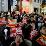 Protesters attend a rally calling for the impeachment of South Korean President Yoon Suk Yeol, who declared martial law, which was reversed hours later, in Seoul, South Korea, December 9, 2024. REUTERS/Kim Kyung-Hoon