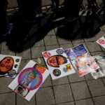 Placards lie on the ground as protesters attend a rally calling for the impeachment of South Korean President Yoon Suk Yeol, who declared martial law, which was reversed hours later, in front of the National Assembly in Seoul, South Korea, December 9, 2024. REUTERS/Kim Kyung-Hoon