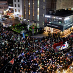 Protesters attend a rally calling for the impeachment of South Korean President Yoon Suk Yeol, who declared martial law, which was reversed hours later, in front of the headquarters of the ruling People Power Party, in Seoul, South Korea, December 9, 2024. REUTERS/Kim Kyung-Hoon