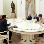Officials, including Russia's President Vladimir Putin, Defence Minister Andrei Belousov and India's Defence Minister Rajnath Singh, attend a meeting in Moscow, Russia December 10, 2024. Sputnik/Sofya Sandurskaya/Pool via REUTERS