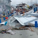 Debris lies on the street in the aftermath of Cyclone Chido, in Mamoudzou, Mayotte, France, December 15, 2024, in this screen grab obtained from video. John Balloz/via REUTERS