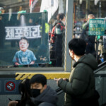 A poster that reads, "Arrest," is taped on a window as protesters rally against the impeached South Korean President Yoon Suk Yeol near his official residence, after investigators were unable to execute an arrest warrant on Friday for Yoon, according to the Corruption Investigation Office for High-ranking Officials, in Seoul, South Korea, January 3, 2025. REUTERS/Kim Hong-Ji