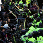 Anti-Yoon protesters clash with police officers as they march towards impeached South Korean President Yoon Suk Yeol's official residence, after investigators were unable to execute an arrest warrant on Friday for Yoon according to the Corruption Investigation Office for High-ranking Officials, in Seoul, South Korea, January 3, 2025. REUTERS/Kim Hong-Ji