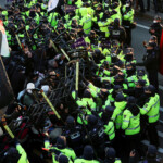 Anti-Yoon protesters clash with police officers as they march towards impeached South Korean President Yoon Suk Yeol's official residence, after investigators were unable to execute an arrest warrant on Friday for Yoon according to the Corruption Investigation Office for High-ranking Officials, in Seoul, South Korea, January 3, 2025. REUTERS/Kim Hong-Ji