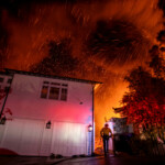 A firefighter battles the Palisades fire as it burns during a windstorm on the west side of Los Angeles, California, U.S. January 8, 2025. REUTERS/Ringo Chiu