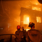 Firefighters battle the Palisades fire as it burns during a windstorm on the west side of Los Angeles, California, U.S. January 8, 2025. REUTERS/Ringo Chiu