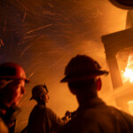 Firefighters battle the Palisades fire as it burns during a windstorm on the west side of Los Angeles, California, U.S. January 8, 2025. REUTERS/Ringo Chiu