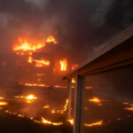 Flames rise from a structure as the Palisades fire burns during a windstorm on the west side of Los Angeles, California, U.S. January 8, 2025. REUTERS/Ringo Chiu