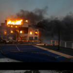 Flames and smoke rise from a structure as the Palisades fire burns during a windstorm on the west side of Los Angeles, California, U.S. January 8, 2025. REUTERS/Ringo Chiu