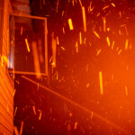 A firefighter battles the Palisades Fire as it burns during a windstorm on the west side of Los Angeles, California, U.S. January 8, 2025. REUTERS/Ringo Chiu