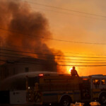 A firefighter battles the Palisades Fire as it burns during a windstorm on the west side of Los Angeles, California, U.S. January 8, 2025. REUTERS/Ringo Chiu