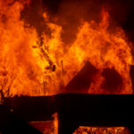 Fire engulfs a structure as the Palisades Fire burns during a windstorm on the west side of Los Angeles, California, U.S. January 8, 2025. REUTERS/Ringo Chiu