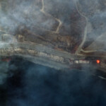 A satellite image shows smoke covering the Pacific Coast Highway along the Malibu coastline due to the devastating wildfires, California, U.S., January 8, 2025. Maxar Technologies/Handout via REUTERS