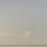 Orange balls of light fly across the sky leaving a trail of smoke behind as debris from a SpaceX rocket launched in Texas is spotted over Port-Au-Prince, Haiti, January 16, 2025 in this screen grab from a video. REUTERS/via Reuters TV