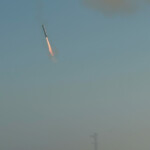 The SpaceX Starship rocket's Super Heavy booster lands as seen from South Padre Island near Brownsville, Texas, U.S. January 16, 2025. REUTERS/Gabriel V. Cardenas.