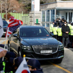 A motorcade believed to be carrying South Korea's impeached President Yoon Suk Yeol leaves for Seoul Western District Court from Seoul Detention Center in Uiwang, South Korea, January 18, 2025. REUTERS/Kim Soo-hyeon